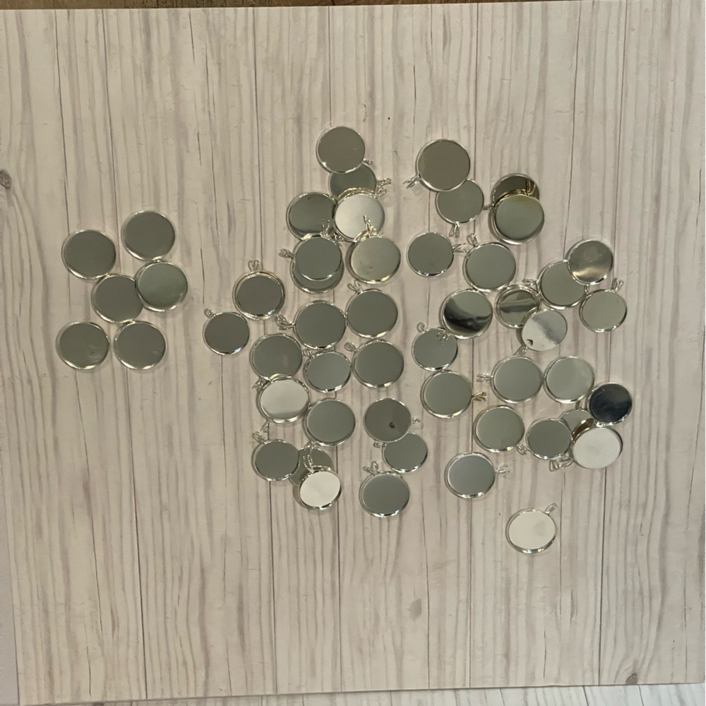 Two different sized blanks for making necklaces/pendants